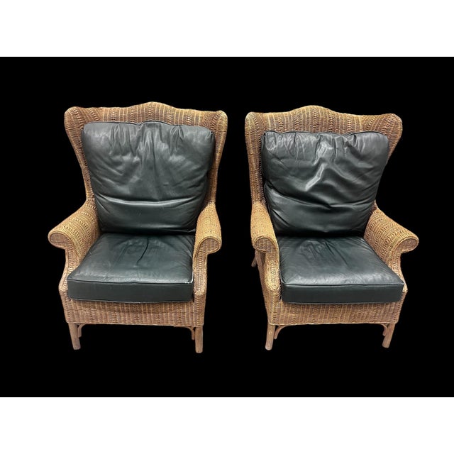 Pair of large wicker wing back lounge chairs with ottoman by Henry Link 1972 wingback chairs with a classic form and bold...