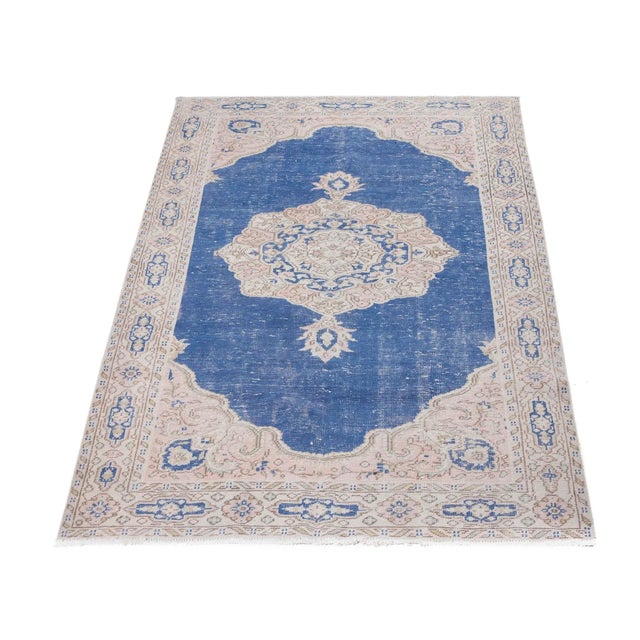 Vintage hand-knotted rug from the Oushak region of Turkey. Approximately 50-60 years old. In very good condition.