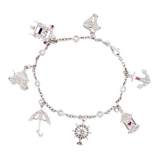 Vintage Diamond Ruby Sapphire 18k White Gold Charm Bracelet For Sale