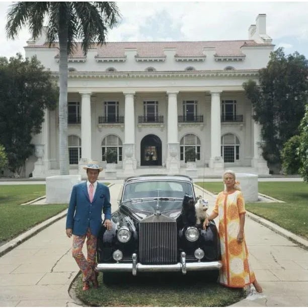 Donald Leas 1968 April 1968: Mr and Mrs Donald Leas with their Rolls Royce and two pet dogs outside The Flagler Museum in...