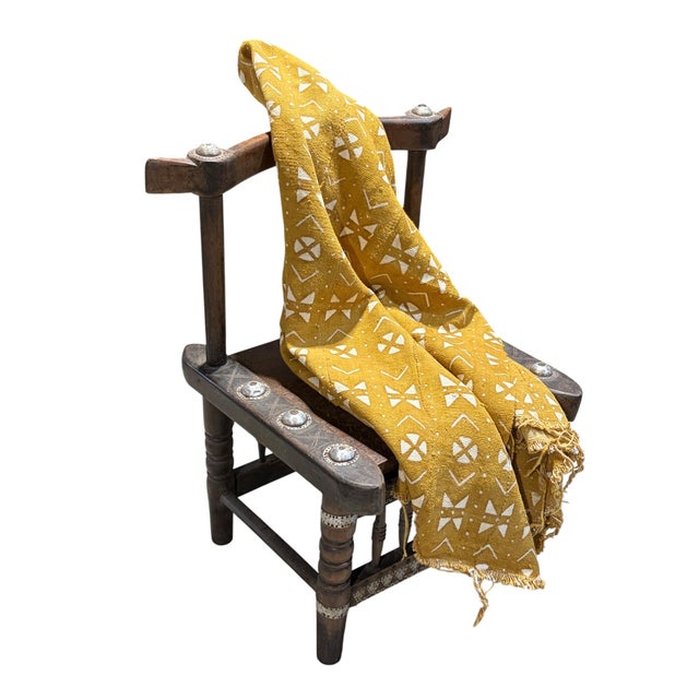 Authentic handwoven mud-cloth textile from Mali, crafted by artisans of the Bamana tribe. This striking cotton fabric...