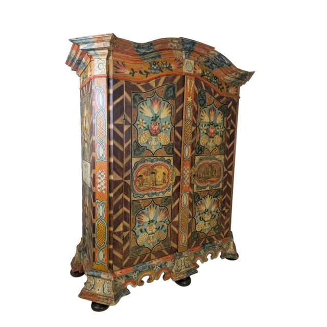 A museum-quality original Florianer Bauernschrank, richly painted in the traditional manner associated with the region of...