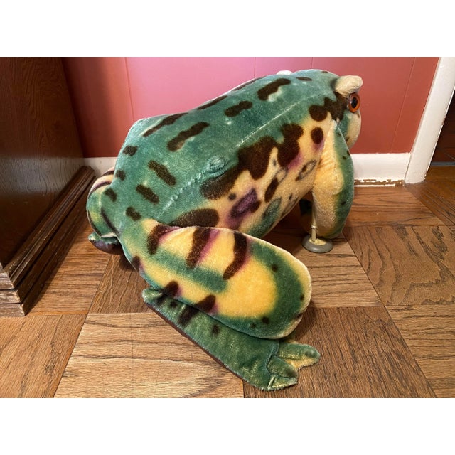 This is a German Steiff production large frog. He was made to be a footstool or ottoman. Possibly a seat for a small...