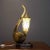 This elegant pipe table lamp was designed by Aldo Tura, it can be dated in the 1950s. The wooden pipe sculpture is covered...
