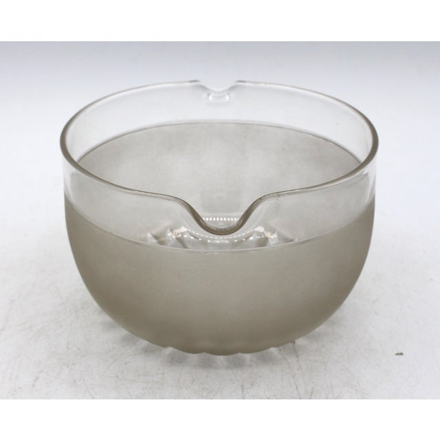 Circa 1840 English glass wine rinser. Blown, cut & frosted to clear glass. 5.75" dia. across rests, 3.25" h.