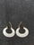 Pair of lovely carved white jade hoop earrings with 5 inset gemstones on one side of the jade. The gemstones are bezel set...
