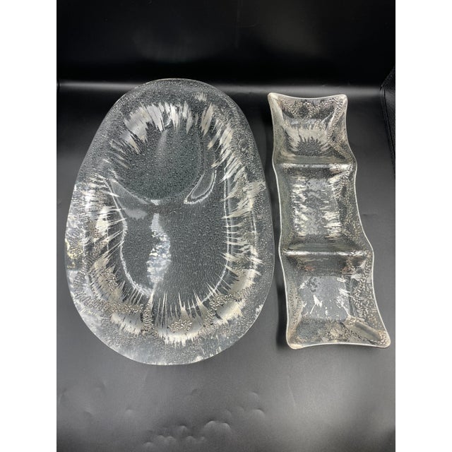 These extremely Rare Dorothy Thorpe Silver “Atomic Splash” indented oblong serving platter and corresponding three section...