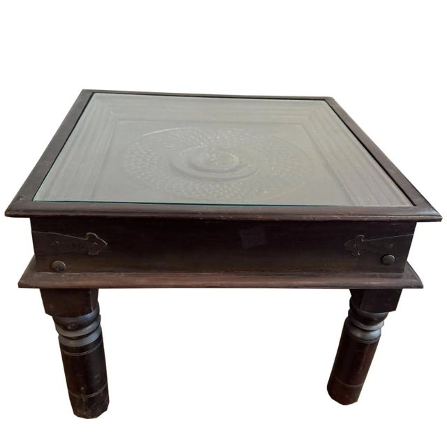 Dimensions: 27" W X 27” D X 23" H Bring artisanal charm and timeless elegance to your home with this Hand-Carved Floral...