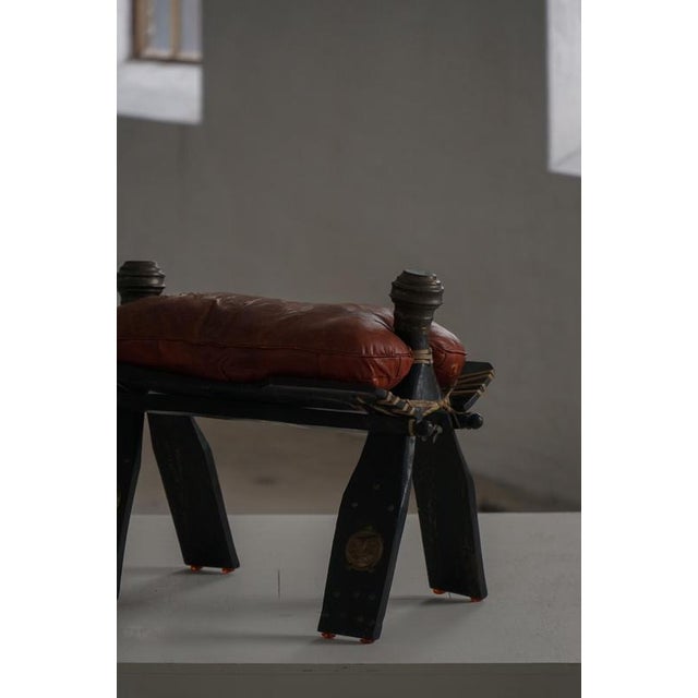 1940s Moroccan Dark Red Upholstered Camel Saddle Ottoman, North Africa, 1940s For Sale - Image 5 of 17