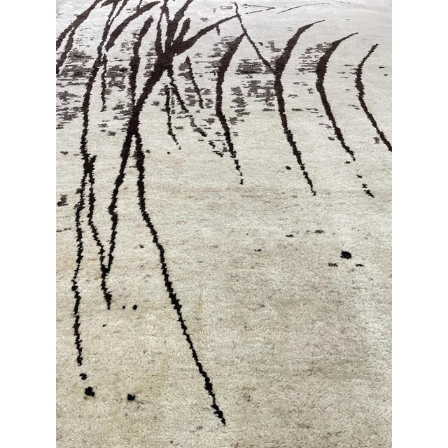 Beautiful hand knotted modern and fashionable collection of borderless designs rug, made of 75% wool and 25% cotton in...