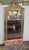 Very fine and unusual art deco wall mirror. Features beveled arched mirror glass with underneath foil design the bottom...