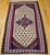 "A vintage Persian Senneh kilim area rug, handwoven in the mid-20th century in the culturally rich Kurdistan region of...