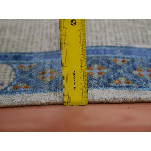 This fabulous Hand-Knotted carpet has been created and designed for extra strength and durability. This rug has been...