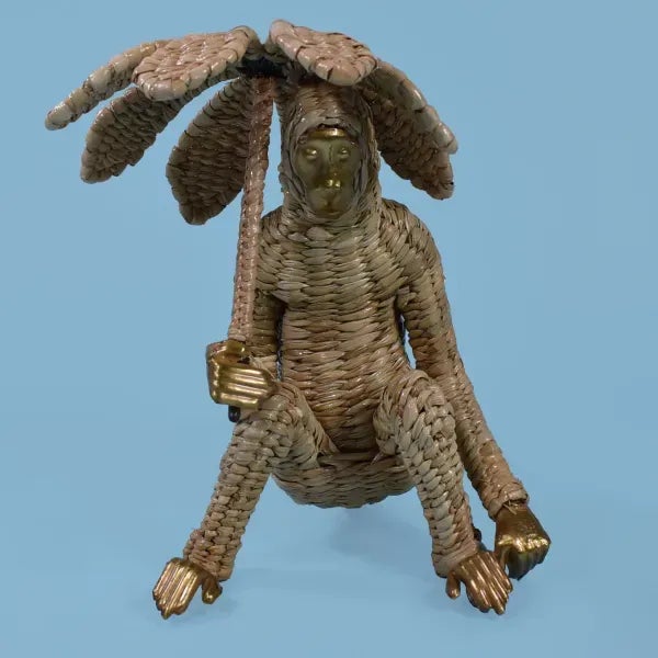 Small Monkey Figure by Mario Lopez Torres. There are minor imperfections to the hand-made woven rattan. (see photos)