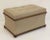 A handsome, comfortable English rectangular upholstered trunk or pouffe ottoman, featuring an upholstered seat with...