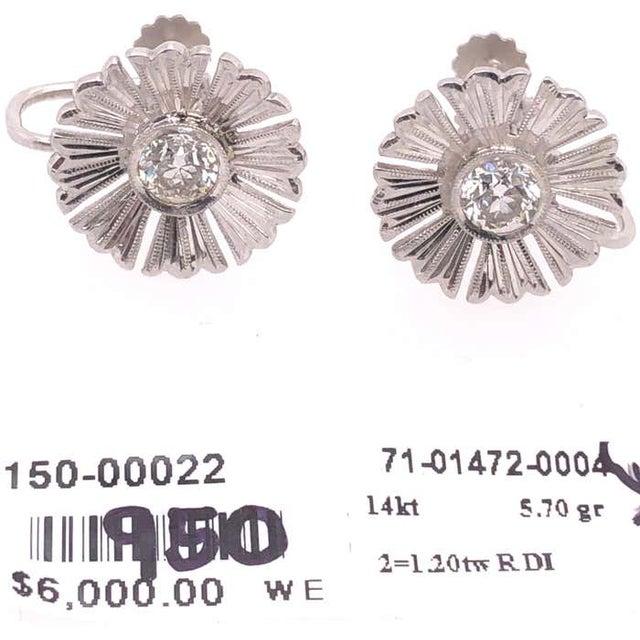14 Karat White Gold Fashion Non Pierce Earrings with Diamonds. 1.20 Total Diamond Weight. 5.70 grams total weight.