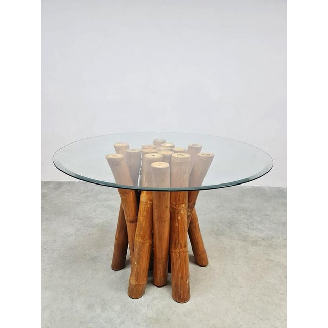 Unique find! This bamboo dining table from the 1950s! The frame consists of thick bamboo that forms the basis for the...