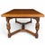 A substantial vintage walnut dining table inspired by Jacobean and Tudor refectory forms. The rectangular top is supported...
