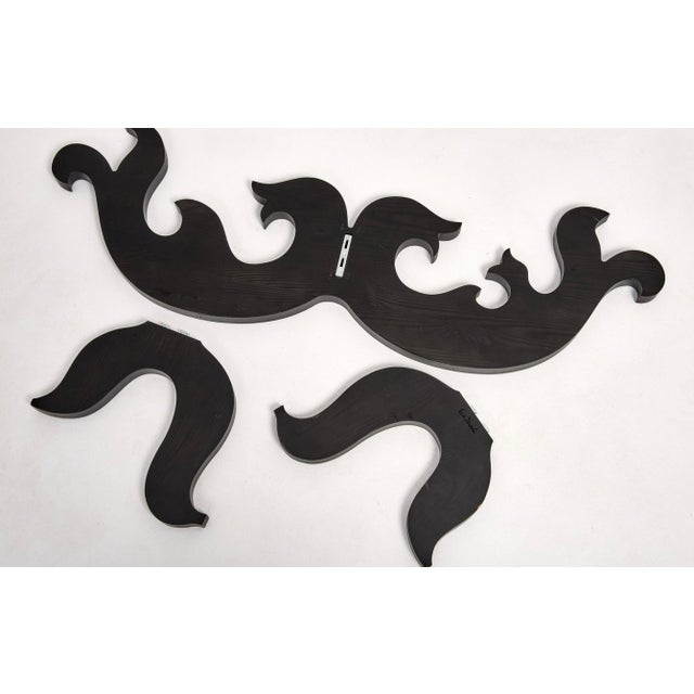 A pretty glass top coffee cocktail table designed by Eva Zeisel for Design Within Reach. DWR retailed this in 1993. It’s...