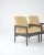Graphic and sophisticated, this pair of vintage upholstered armchairs showcase the versatility and elegance of Central...