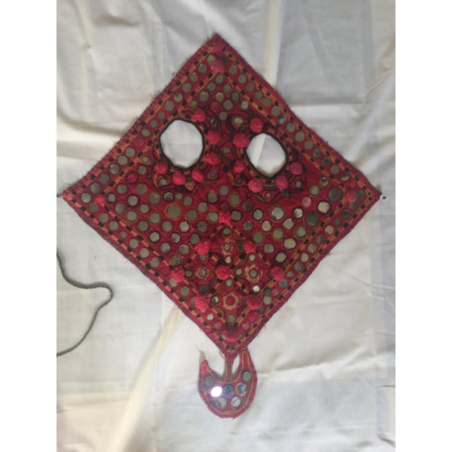 A vintage hand-embroidered mirrored cotton camel mask adornment with shell tassels. One of a kind. Purchased in Jaipur,...