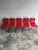 Red Slatted Chair with Black Metal Frame For Sale - Image 9 of 9
