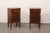 A pair of Italian of wooden side chests from the 19th century. This pair of antique smaller cabinets from Italy each have...