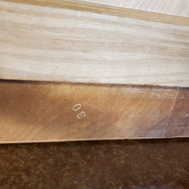 This is a great pair of Milo Baughman designed end tables for Glenn of California with a magazine shelf and book cubby....