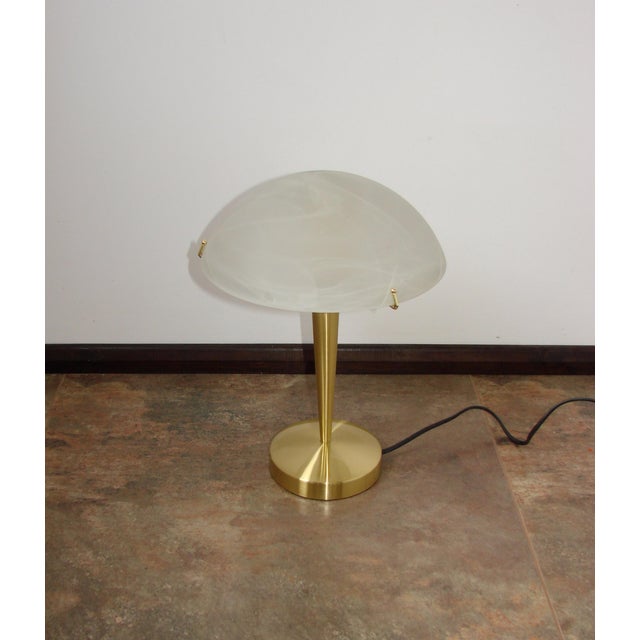 Modern Gilt and Glass Table Lamp, 2000s, in Very Good conditions. Designed from 2000 European Plug (up to 250V).The wiring...