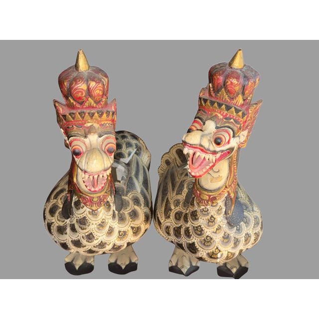Two gorgeous Balinese Indonesian religious/folk art pieces, made of light Suar wood. A rare find, especially in a pair....