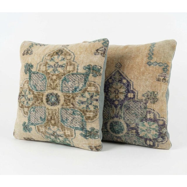 This beautiful 20'' x 20'' pillow cover set was made from authentic Turkish rug pieces. Bright colors of wool adorn the...