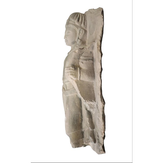 Marvelous antique statue of a bodhisattva. With a serene expression and a crown depicting the Buddha, this figure...