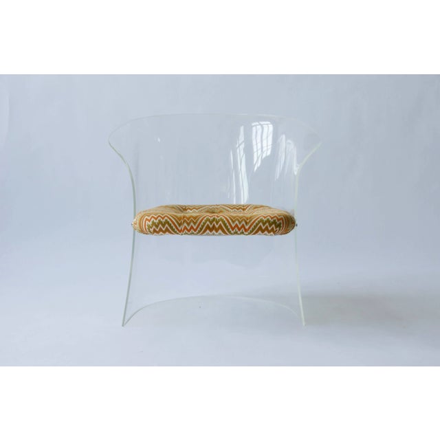 1960s Lucite chair with floating seat.