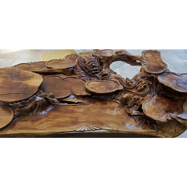 Ming style, multi-tiered, tea table, accent table with four 'stump' style stools. Hand carved from root of a single tree....