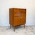 A metamorphic cocktail cabinet, circa 1950s-60s, bearing the retailer's label of Cox & Cox Ltd, The Furnishing Store,...