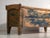This antique blue-painted chest in pine wood is a Central European peasant chest with shaped end boards and splayed feet....