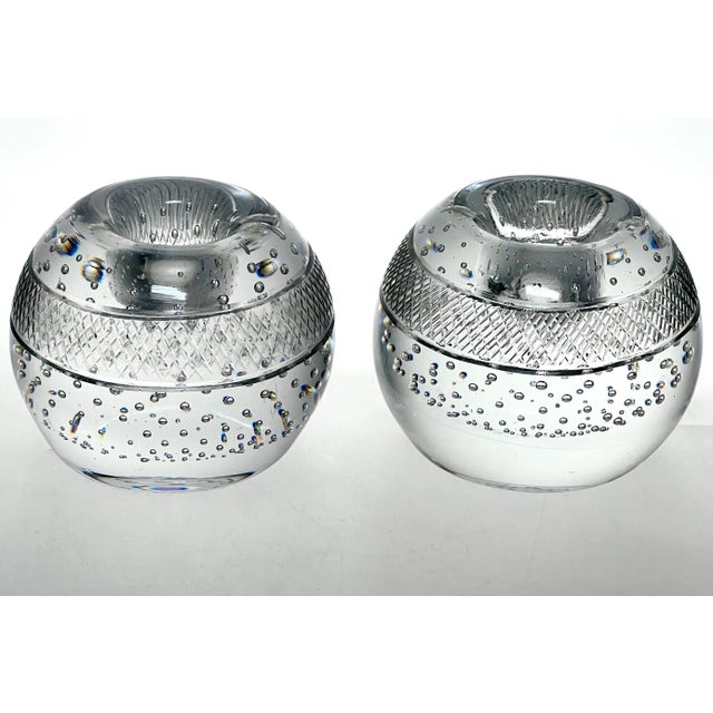 A matching pair of vintage hand blown solid glass match strikers with hand-cut cross hatched band to the side surface and...