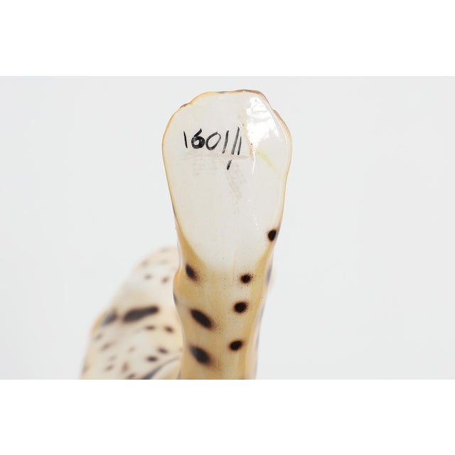 A striking mid‑century Italian ceramic sculpture by Giovanni Rozan, depicting a prowling leopard in vivid hand‑painted...