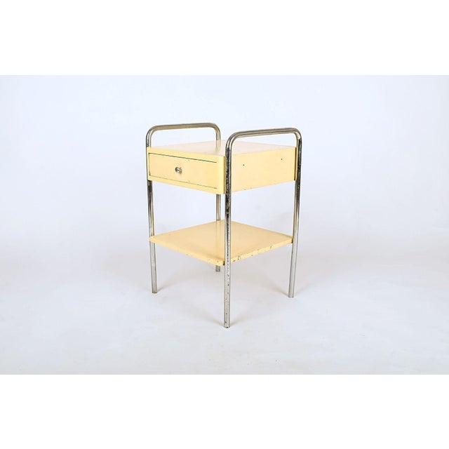 Bauhaus Nightstand in Tubular Steel from Slezak, 1930s, in Good conditions. Designed 1920 to 1949 This piece is attributed...