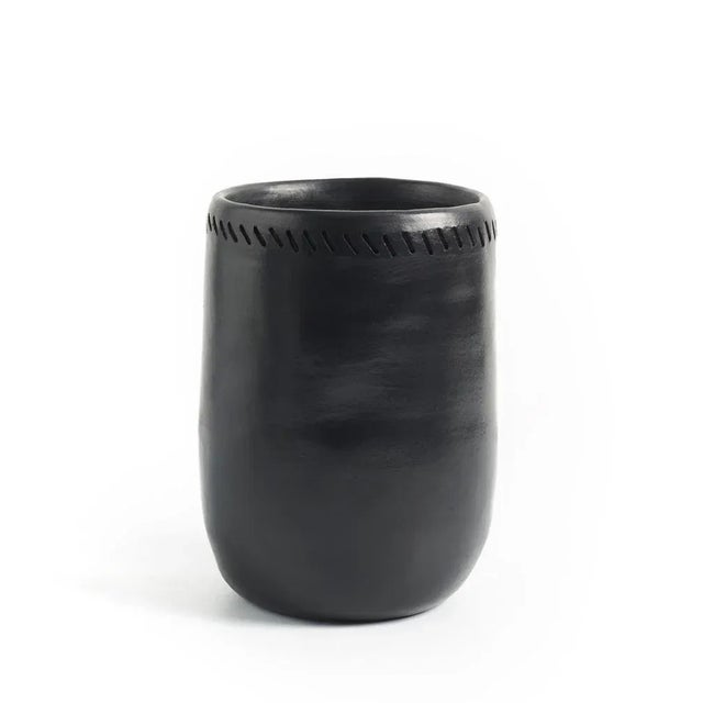 Vase 1 barro dining by Sebastian Herkner Materials: Heat-resistant Black ceramic. Technique: Glazed. Oven cooked and...
