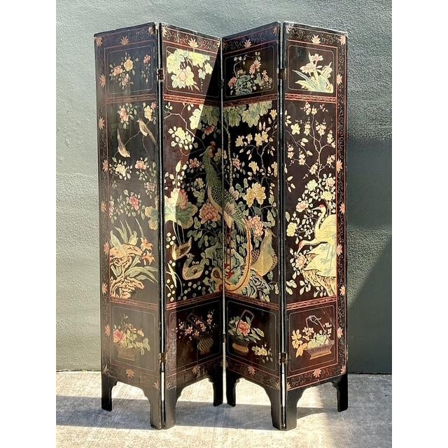Elevate your interior with this striking vintage Chinoiserie four-panel folding screen, a masterclass in Far Eastern-...