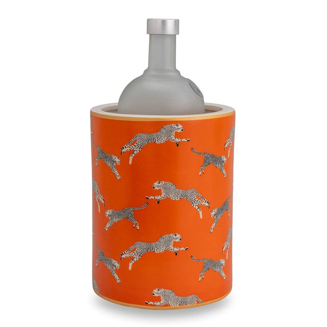 Leaping Cheetah by Scalamandre' is a signature pattern featuring cheetahs frolicking against a backdrop of saturated...