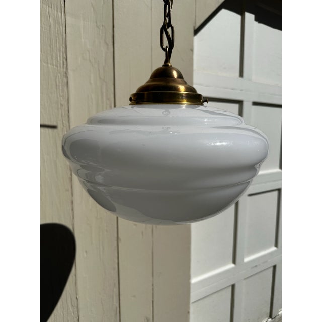 Old Lights On is pleased to offer this vintage school house globe with vintage brass hanging fixture. It is rewired and...