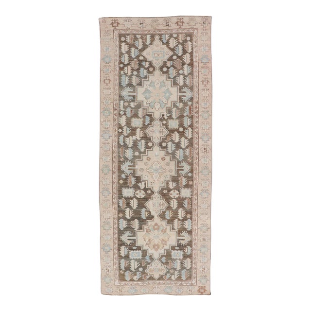 Early 20th Century Antique Kazak Runner With Geometric Design and Medallions on a Brown Field For Sale