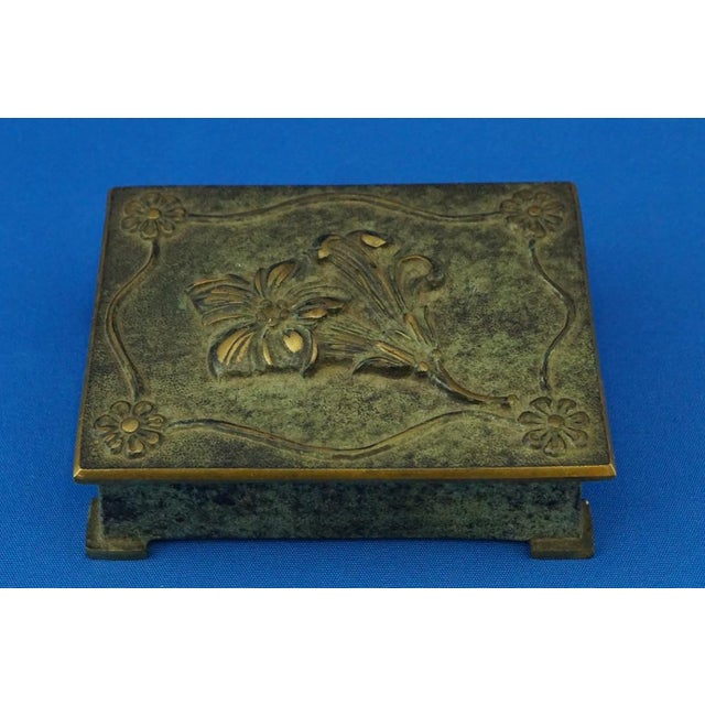 Wonderful bronze cigarette box with bas-relief flowers, made in full Art Nouveau style in Denmark around 1920,...
