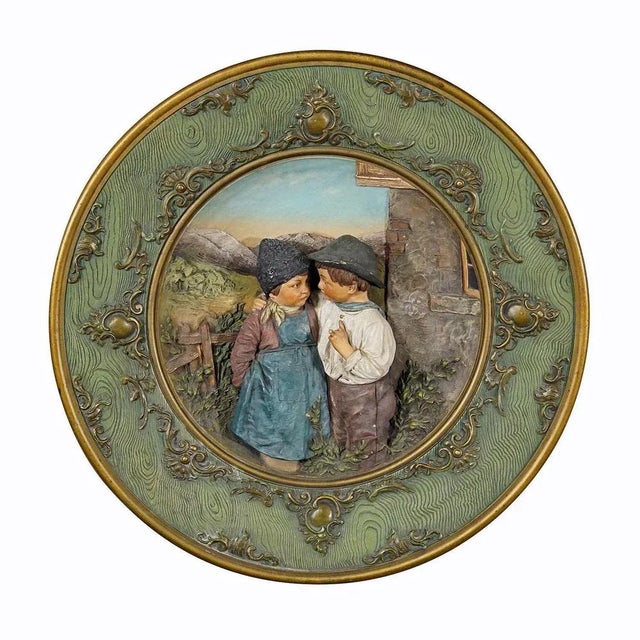 Terracotta Wall Plate with Lovely Children in Traditional Costumes by Johann Maresch A large terracotta wall plate...