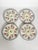 Charming set of four French ceramic oyster plates dating from the 1950s, featuring a colorful hand-painted floral...