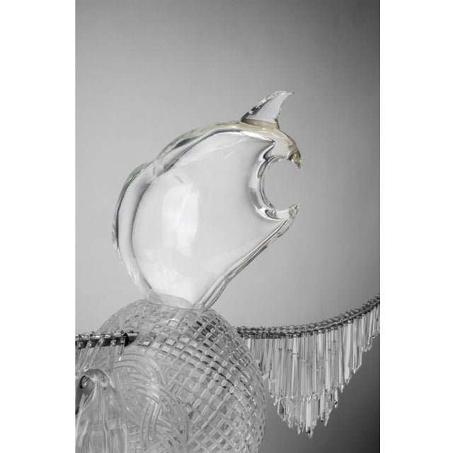 A visually striking contemporary sculpture titled "Cristal Soul," created around 2010 in art glass and metal, part of a...