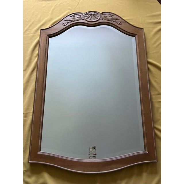 Early 21th Century c2003 Ethan Allen wall mirror from the Country French Collection. Features white waxed carvings and...