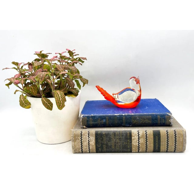 Sensational glass sculpture of a bird made in Italy the mid-late 20th century. Bright orange glass embedded into the...